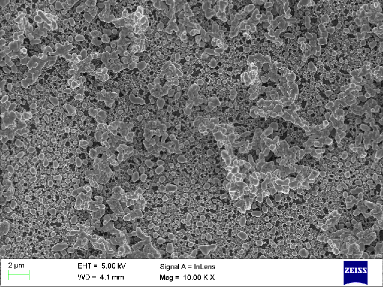 Scaled down png of SEM micrograph. Click on the image to download TIFF file in native resolution (sans tags). The sample is electrophoretically deposited TiO2 microparticles.